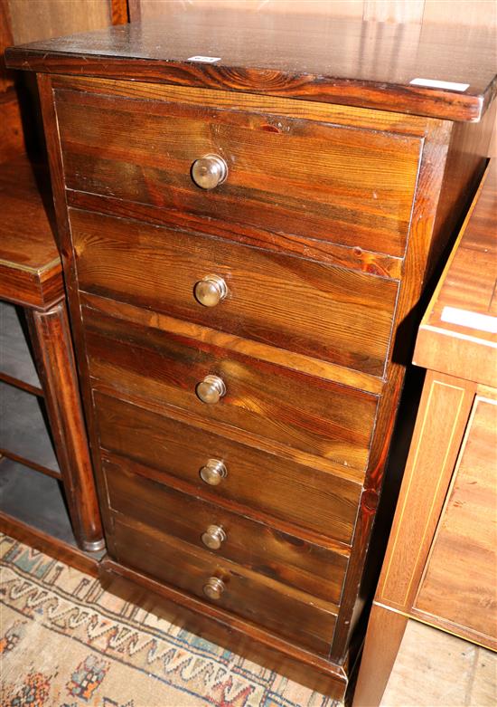 Stained pine chest of drawers